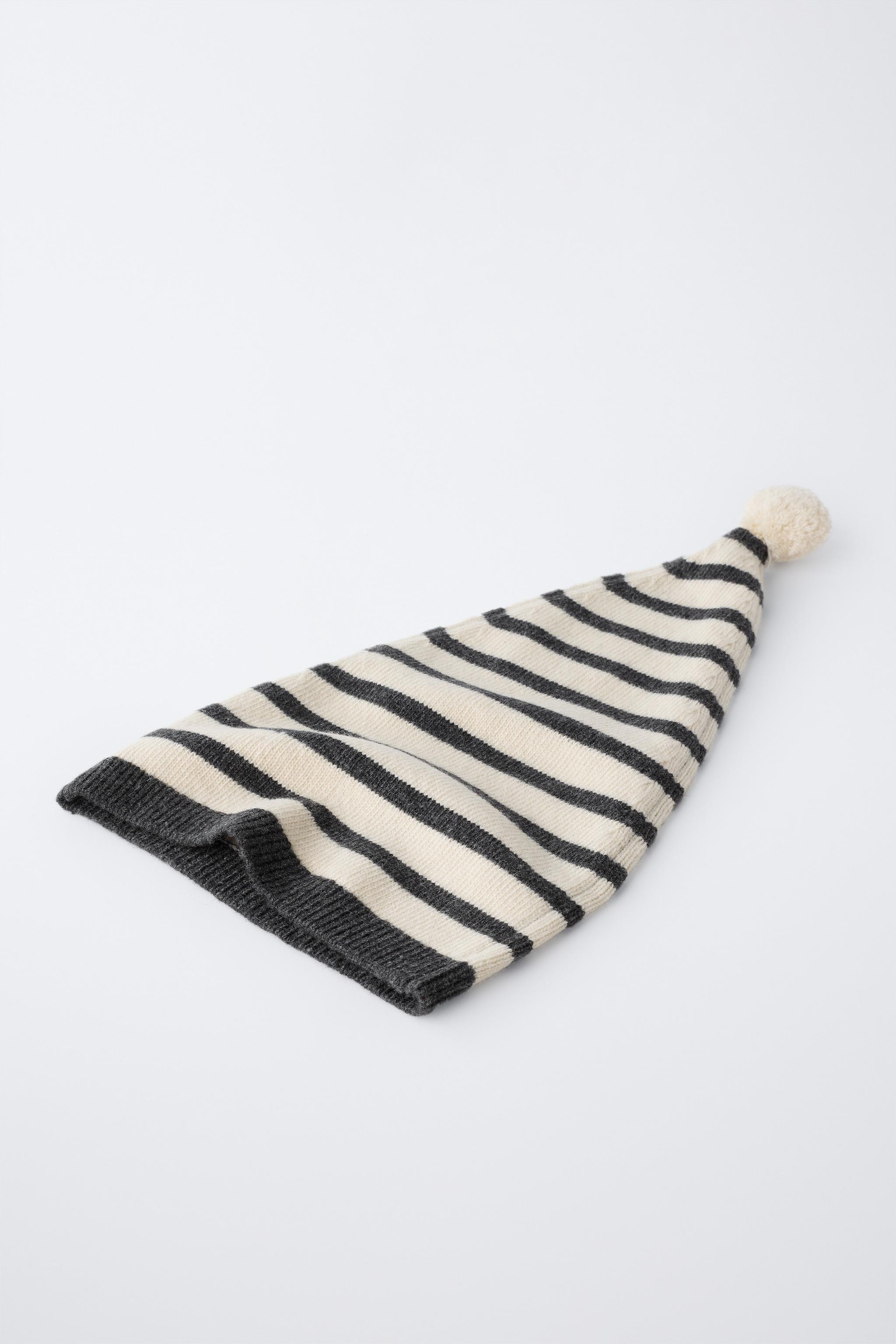 BONNET EN MAILLE RAYÉ À POMPON AVEC LAINE